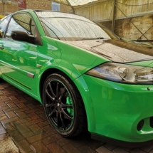Side View Of Green Nissan Skyline With Green AlloyGators