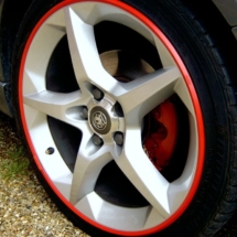 Vauxhall with red AlloyGator Wheel Protectors.jpg