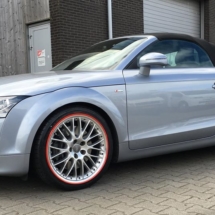 Side View Of Audi With Silver Alloy Wheels & Red AlloyGator Wheel Protectors
