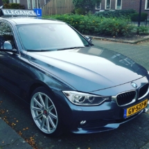 Black BMW With SilverAlloy Wheels And Black AlloyGator Wheel Protector