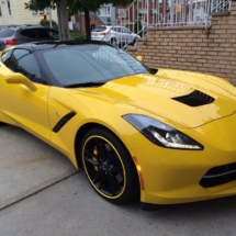 Yellow Chevrolet Corvette With Black Alloy Wheels, Yellow AlloyGator Wheel Protection And Yellow Wheel Callipers