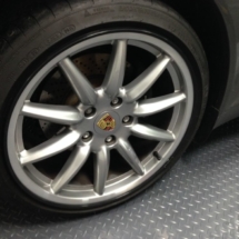 Silver Porsche Alloy Wheel With Black AlloyGator Wheel Protector
