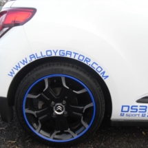 Close Up Of A White Citroen With Dimond Cut Black Alloy Wheels With Blue AlloyGator Alloy Wheel Rim Protector