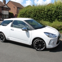 Side View Of A White Citroen With Dimond Cut Silver And Black Alloy Wheels And White AlloyGator Alloy Protector