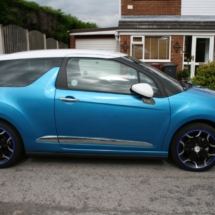Side View Of A Blue Citroen With Dimond Cut Silver And Black Alloy Wheels With Blue AlloyGator Alloy Wheel Protector