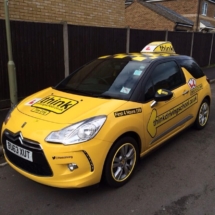 Front / Side View Of Yellow Citroen With Dimond Cut Silver And Black Alloy Wheels And Yellow AlloyGator Alloy Wheel Rim Protector