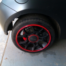 Black Fiat 500 With Black Alloy Wheels, Red AlloyGator Alloy Wheel Protector And Red Brake Callipers