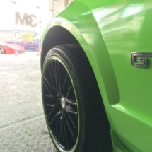 Front View Of Green Ford GT With Original Green AlloyGator Alloy Wheel Protectors
