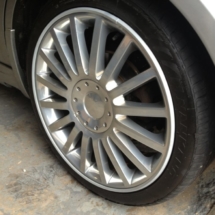 Close Up Of Ford With Silver Alloy Wheels & Silver AlloyGator Alloy Wheel Protector