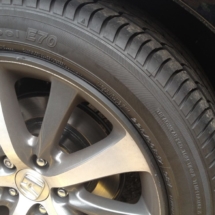 Close Up Of Honda Silver Alloy Wheel With Black AlloyGator Wheel Protector
