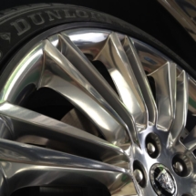 Close Up Of A Silver Jaguar Alloy Wheel With Black AlloyGator Alloy Wheel Protector