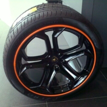 Close Up Of Lamborghini Alloy Wheel With Orange AlloyGator Alloy Wheel Protector