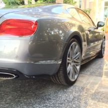 Rear Side View Of Silver Bentley With Silver Alloy Wheels And AlloyGator Wheel Protector