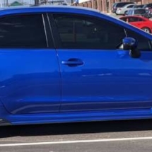 Blue Subaru with Silver AlloyGators