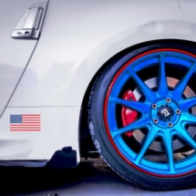 White Car with Blue Alloy Wheels and Red AlloyGators