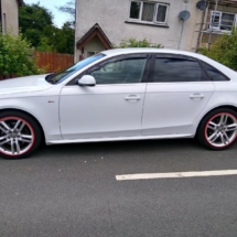 White Audi with Red AlloyGators